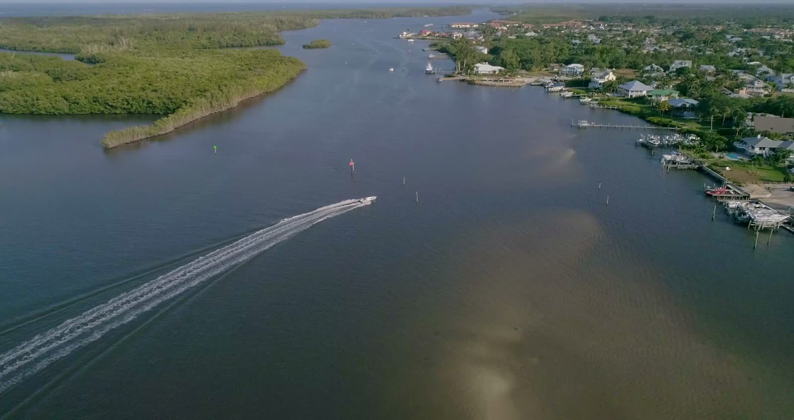 birds-eye-view-of-a-speed-boat-on-river-and-stuart.mp4