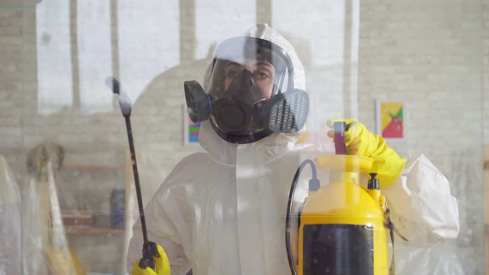 close-up-exterminator-in-overalls-carries-out-surf.mp4