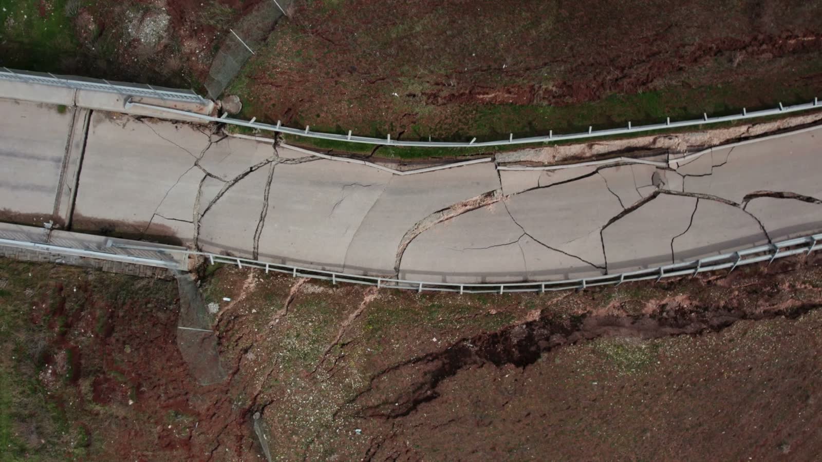 cracks-on-asphault-rural-road.mp4