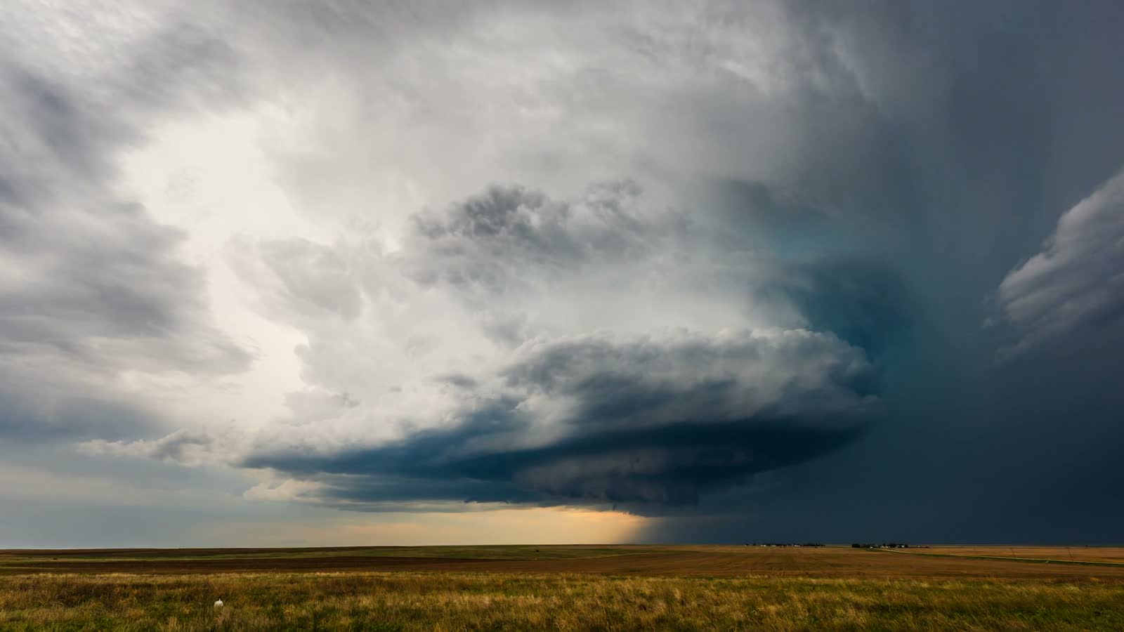 dramatic-clouds-over-field-time-lapse.mp4