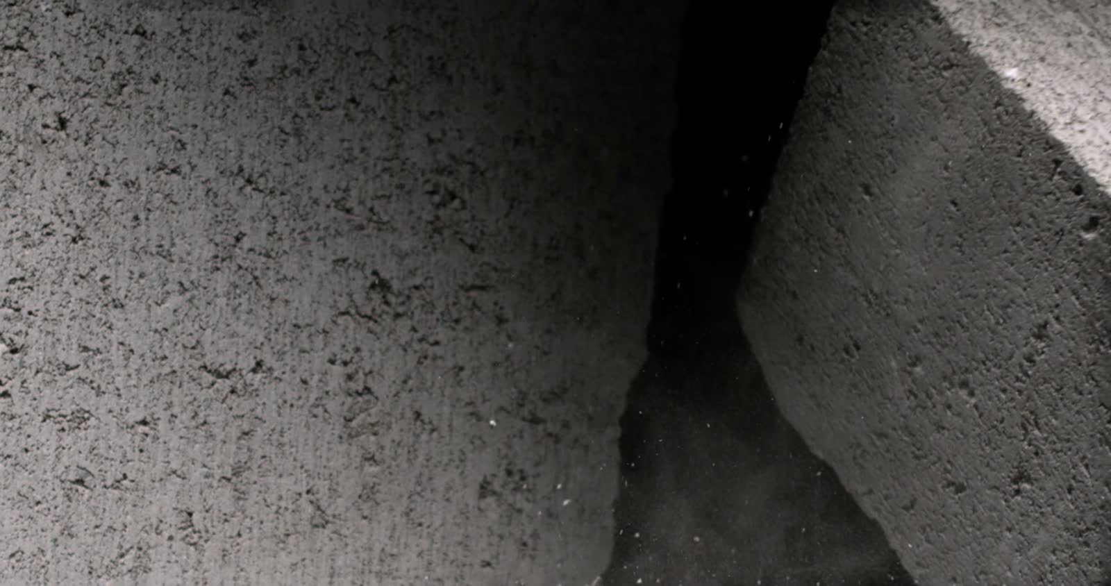 dramatic-cracking-concrete-reveal-transition.mp4