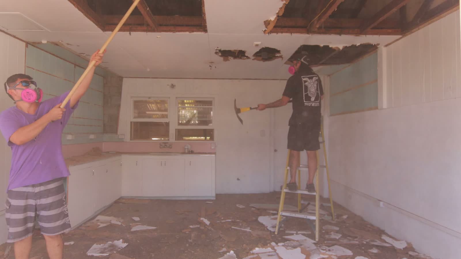 men-remodeling-home-wearing-protective-respirators.mp4