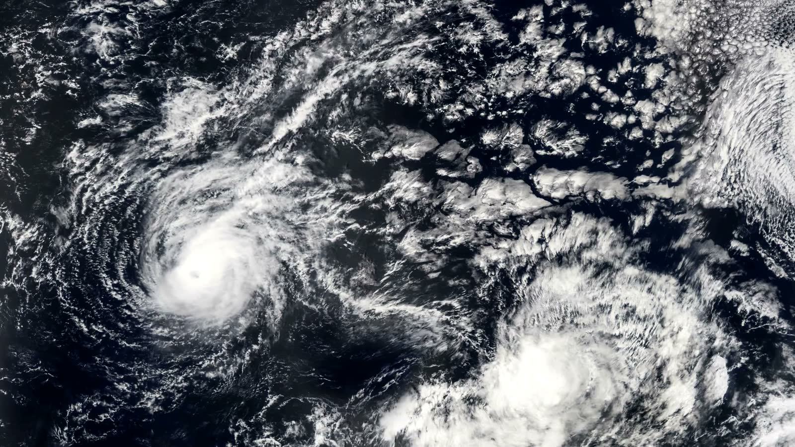 satellite-view-of-two-rotating-hurricanes.mp4