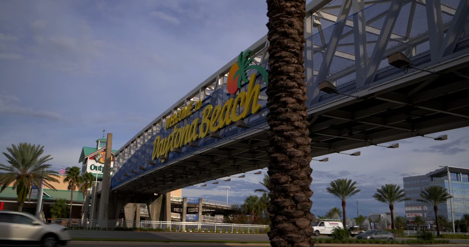 welcome-to-daytona-beach-sign-on-highway-in-sunny.mp4