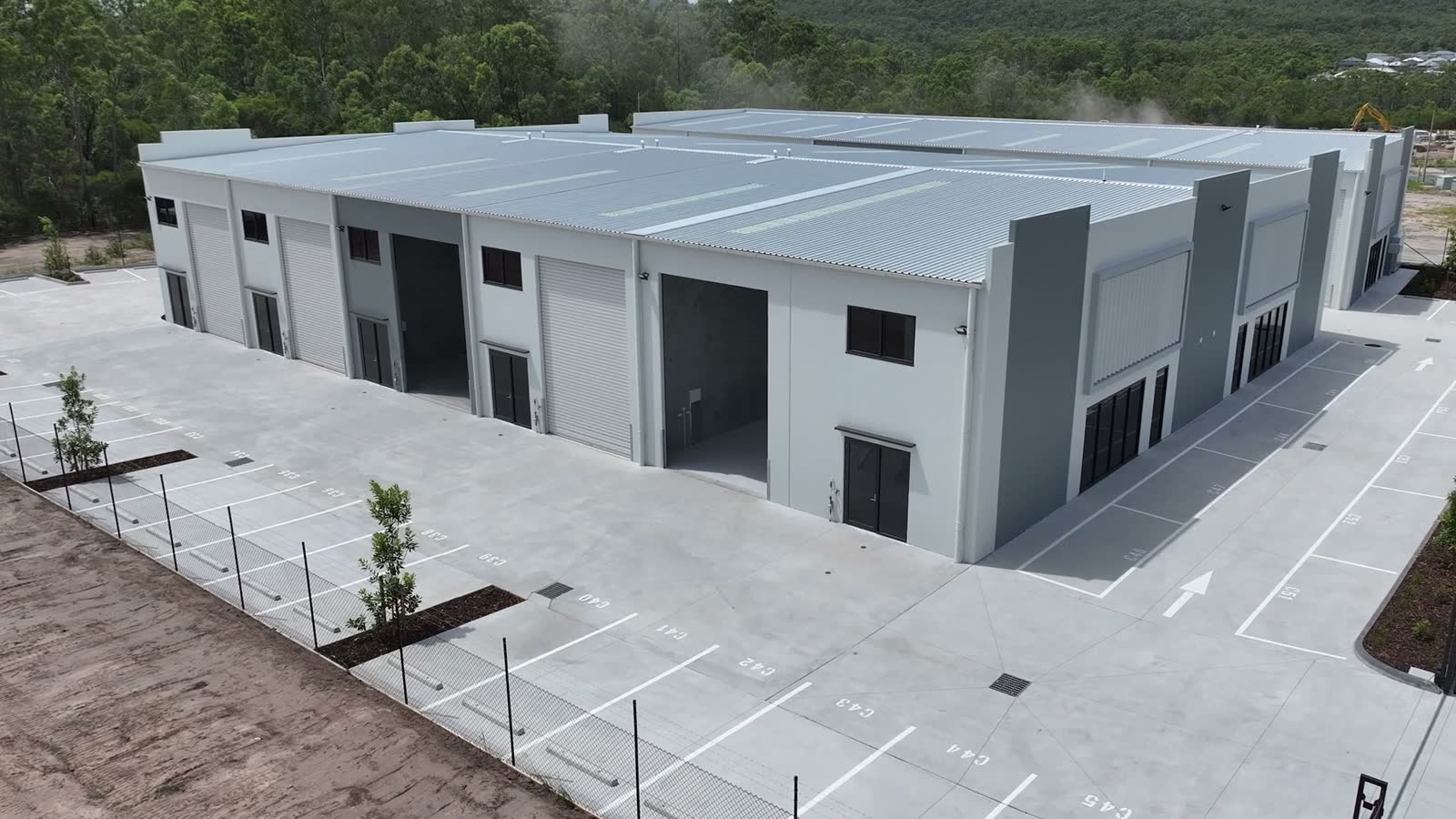 aerial-view-of-gray-commercial-buildings-in-indust.mp4
