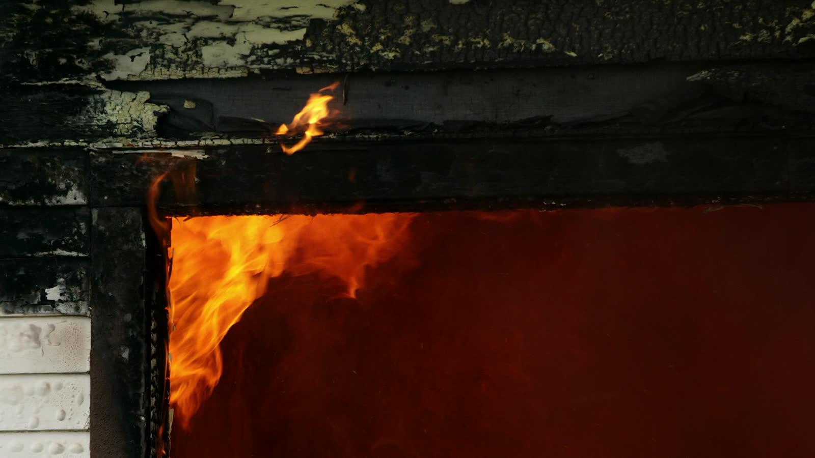 building-flames-burning-in-charred-frame.mp4