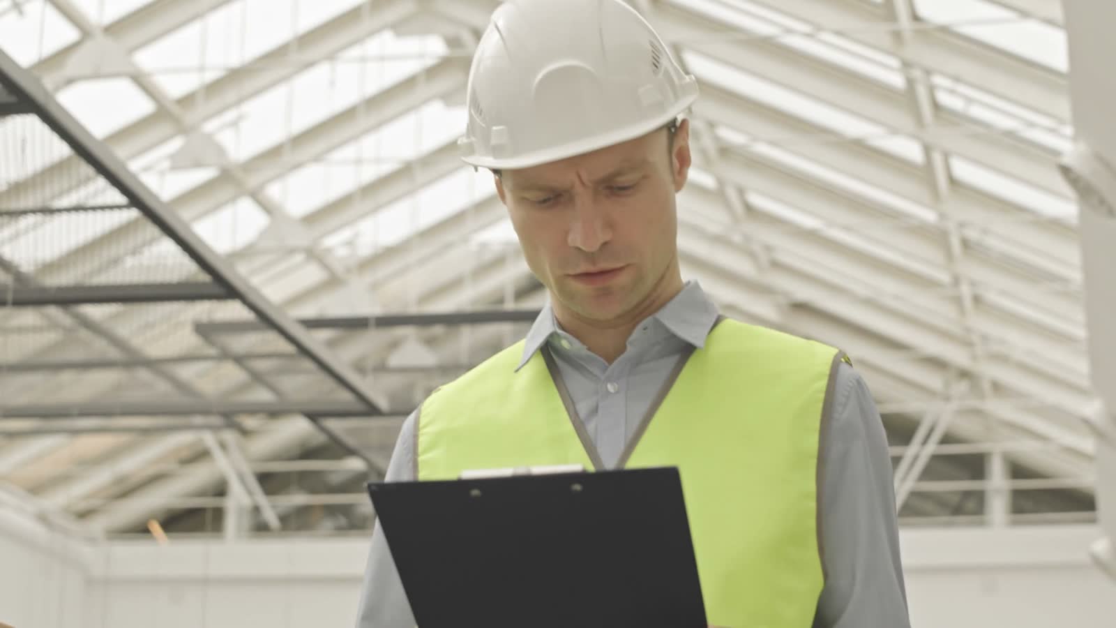 construction-worker-inspects-a-clipboard.mp4