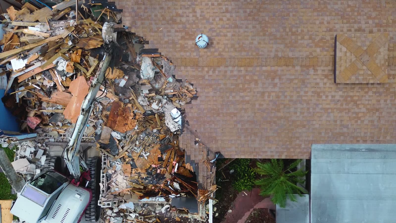 home-destroyed-after-storm-damage-and-excavator.mp4