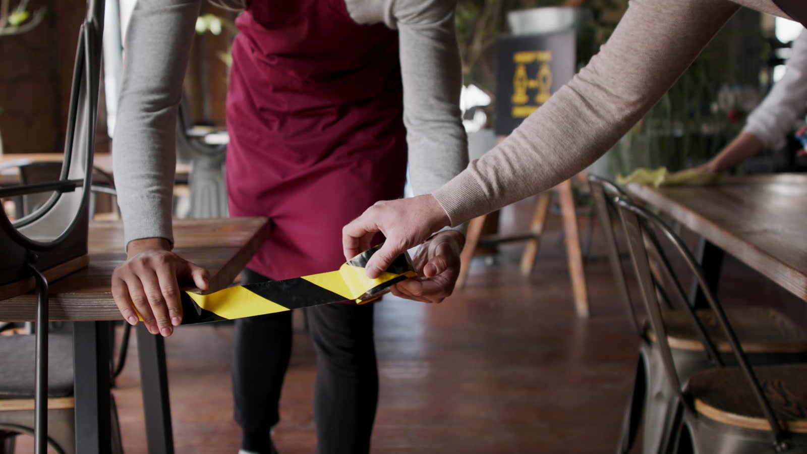 restaurant-reopening-preparation-with-waiters-wear.mp4