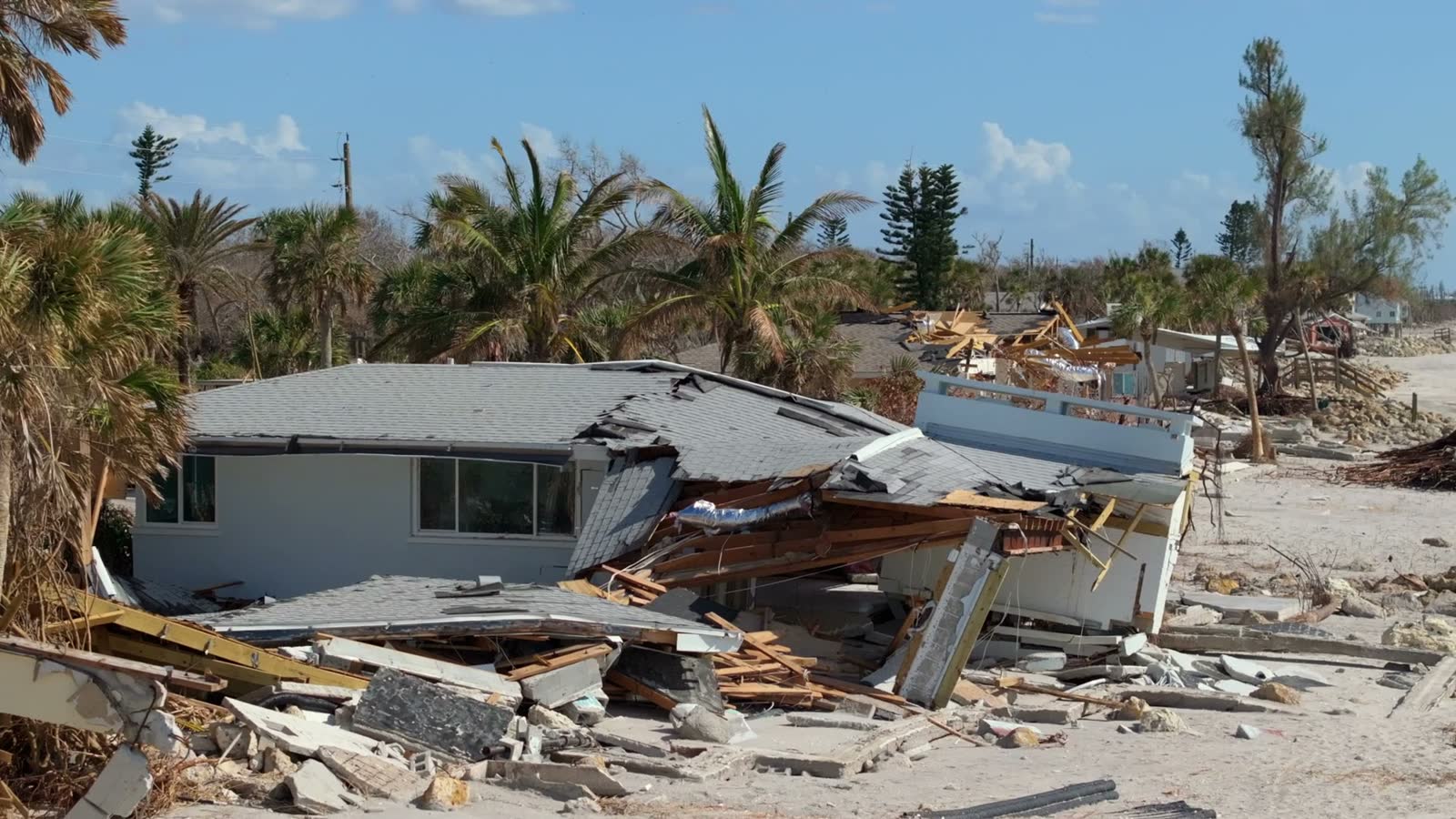 A building in total structural failure, gutted and awaiting demolition after the storm