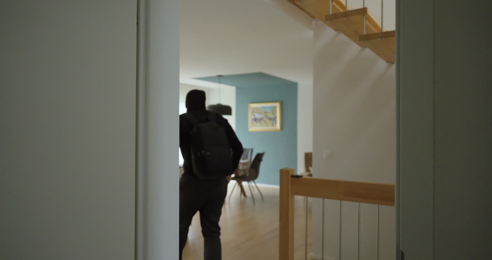burglar-wearing-balaclava-stealing-painting-from-m.mp4