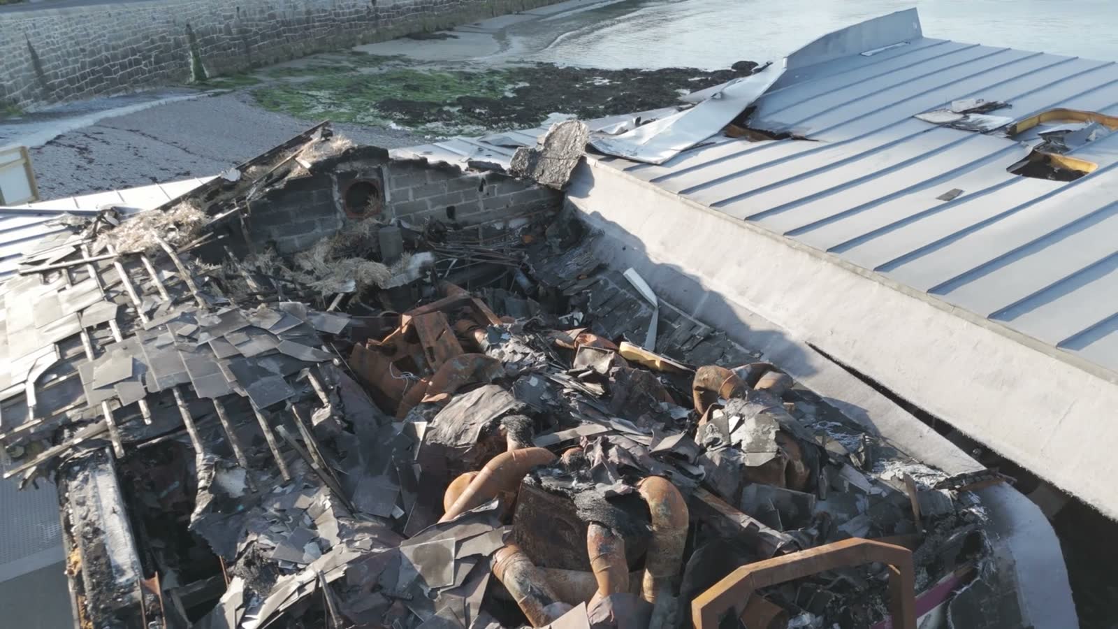 close-aerial-footage-of-fire-damaged-restaurant-sh.mp4