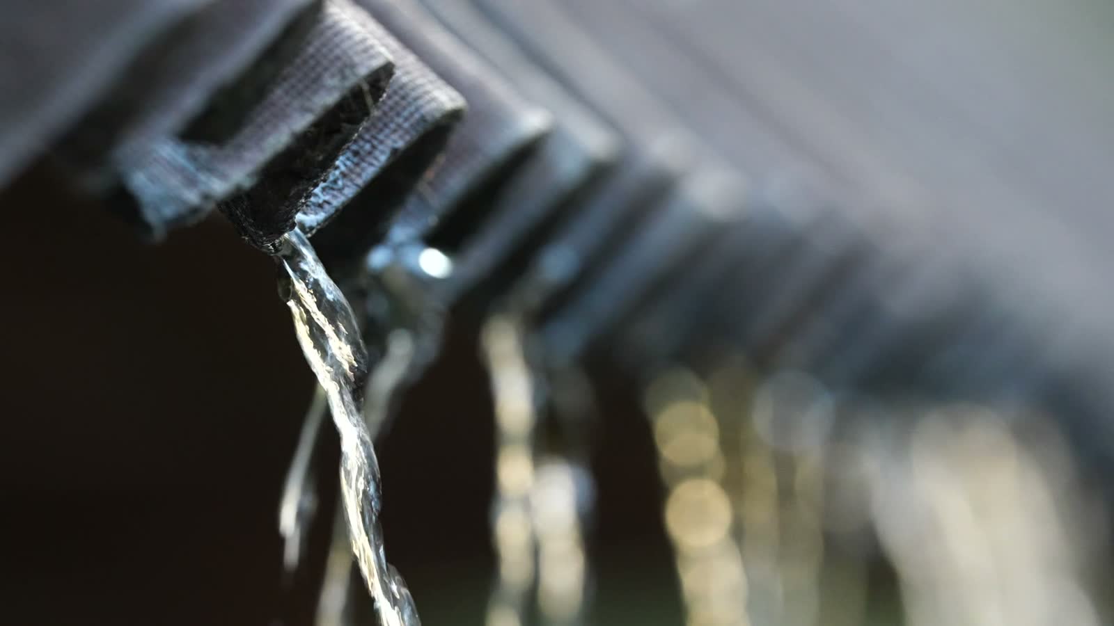 water-run-down-drain-close-up-heavy-rain-pour-dr.mp4