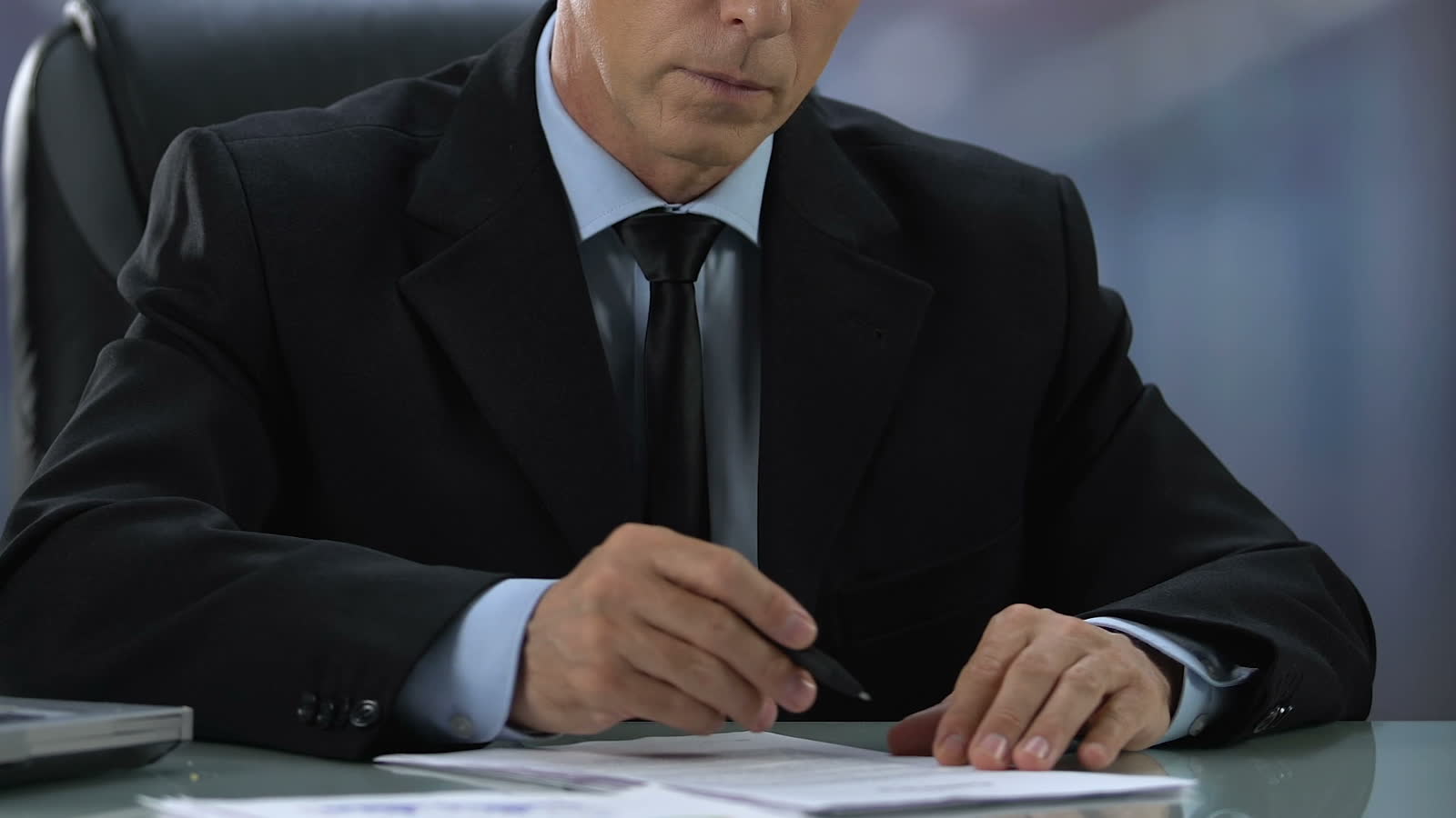 businessman-reading-and-signing-contract-lawyer-w.mp4
