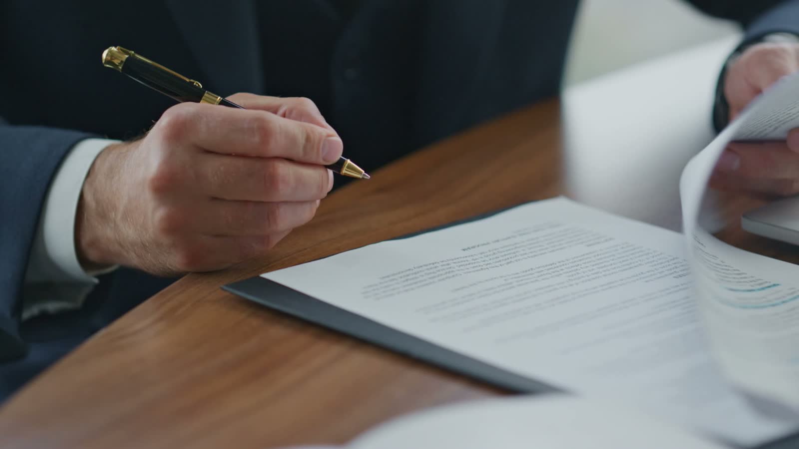 businessman-signing-official-documents-close-up.mp4