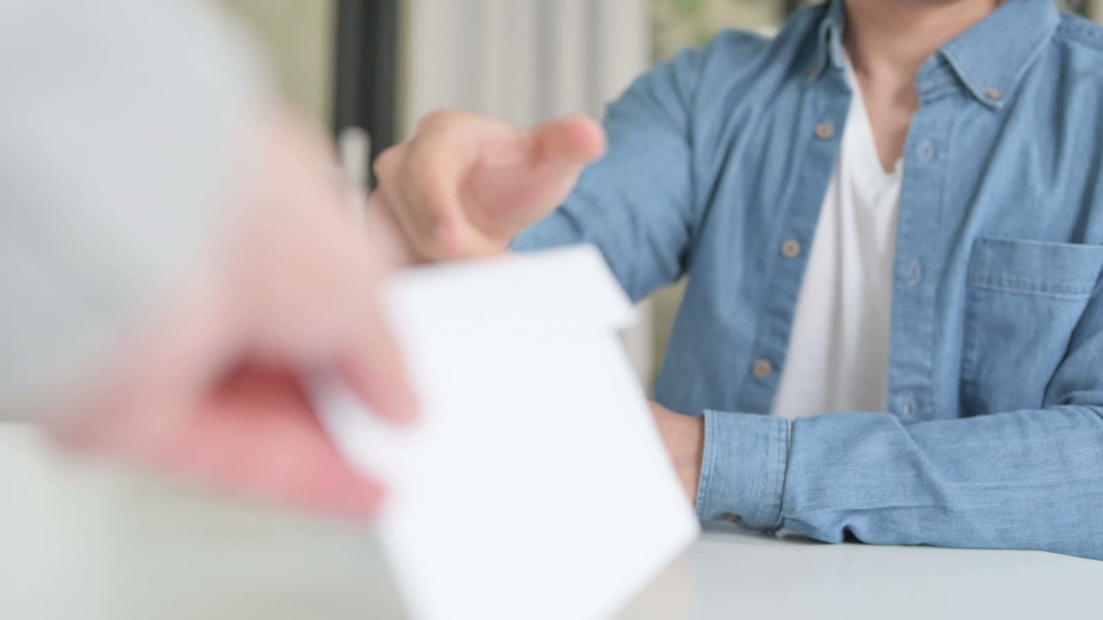 close-up-of-male-accepting-envelop-and-reading-pap.mp4