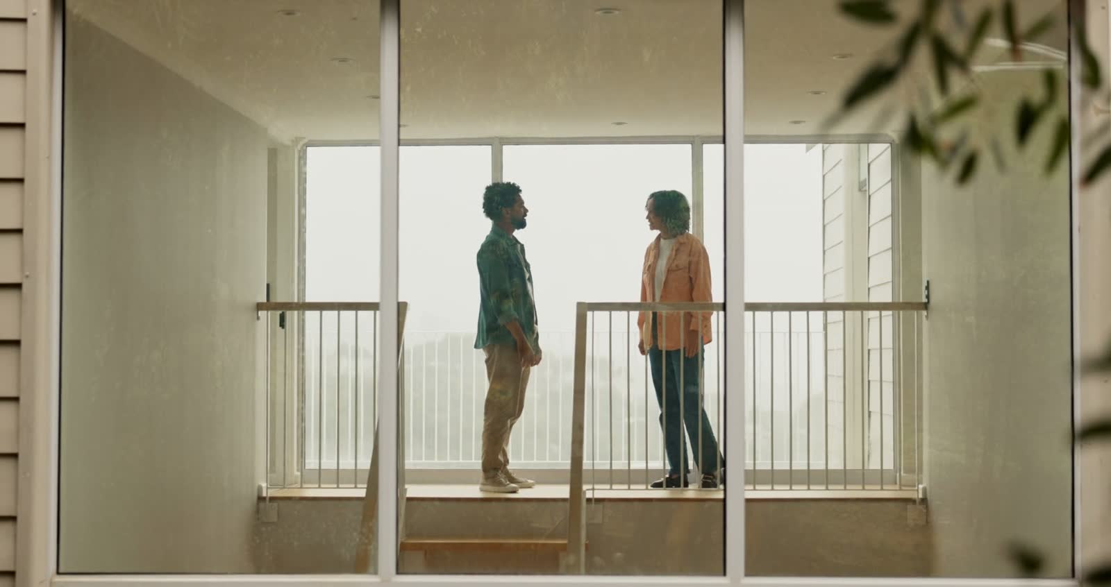 couple-conversing-inside-house-walk-toward-the-cam.mp4