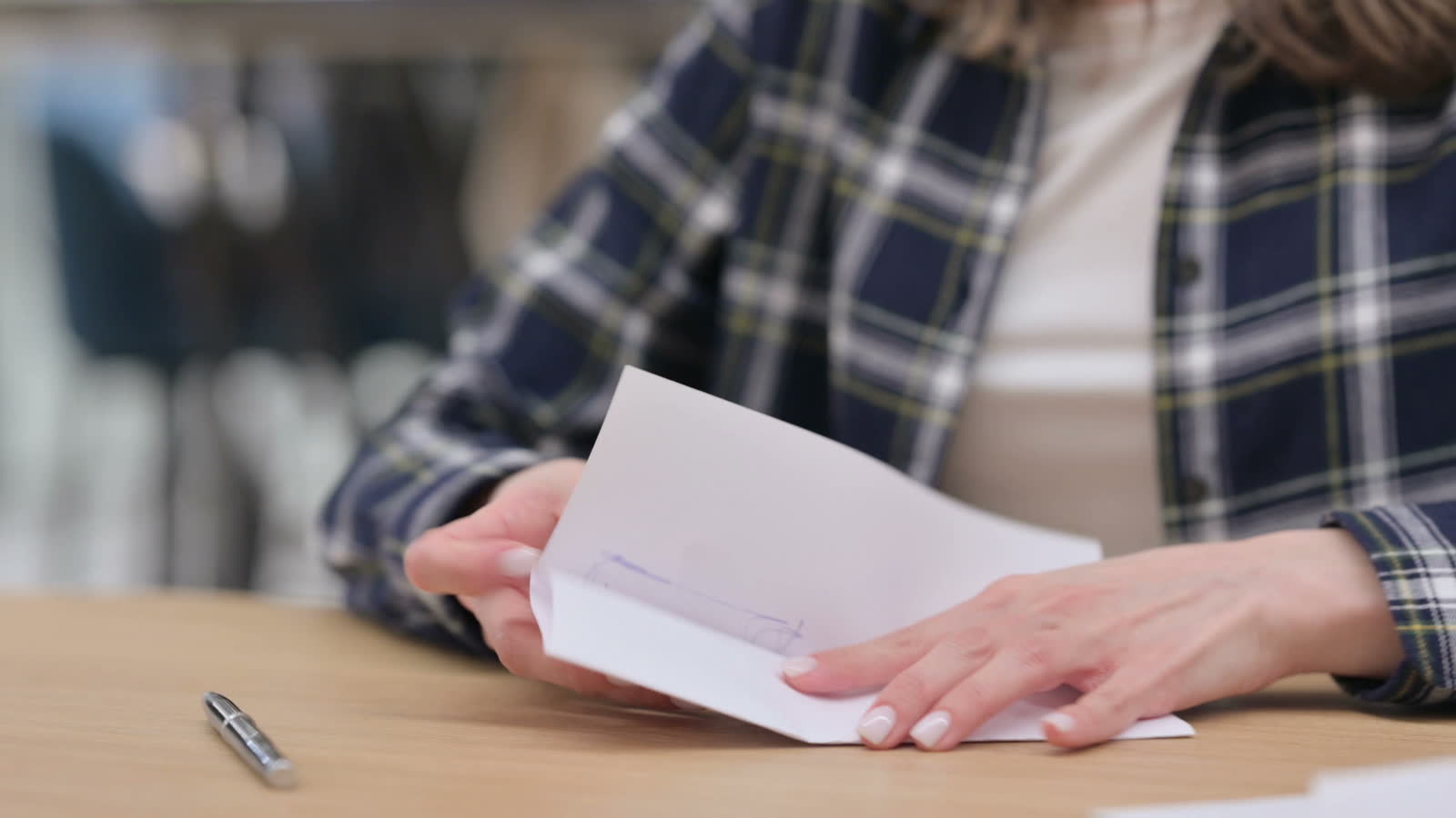 female-hands-putting-letter-in-envelop-an-giving-c.mp4