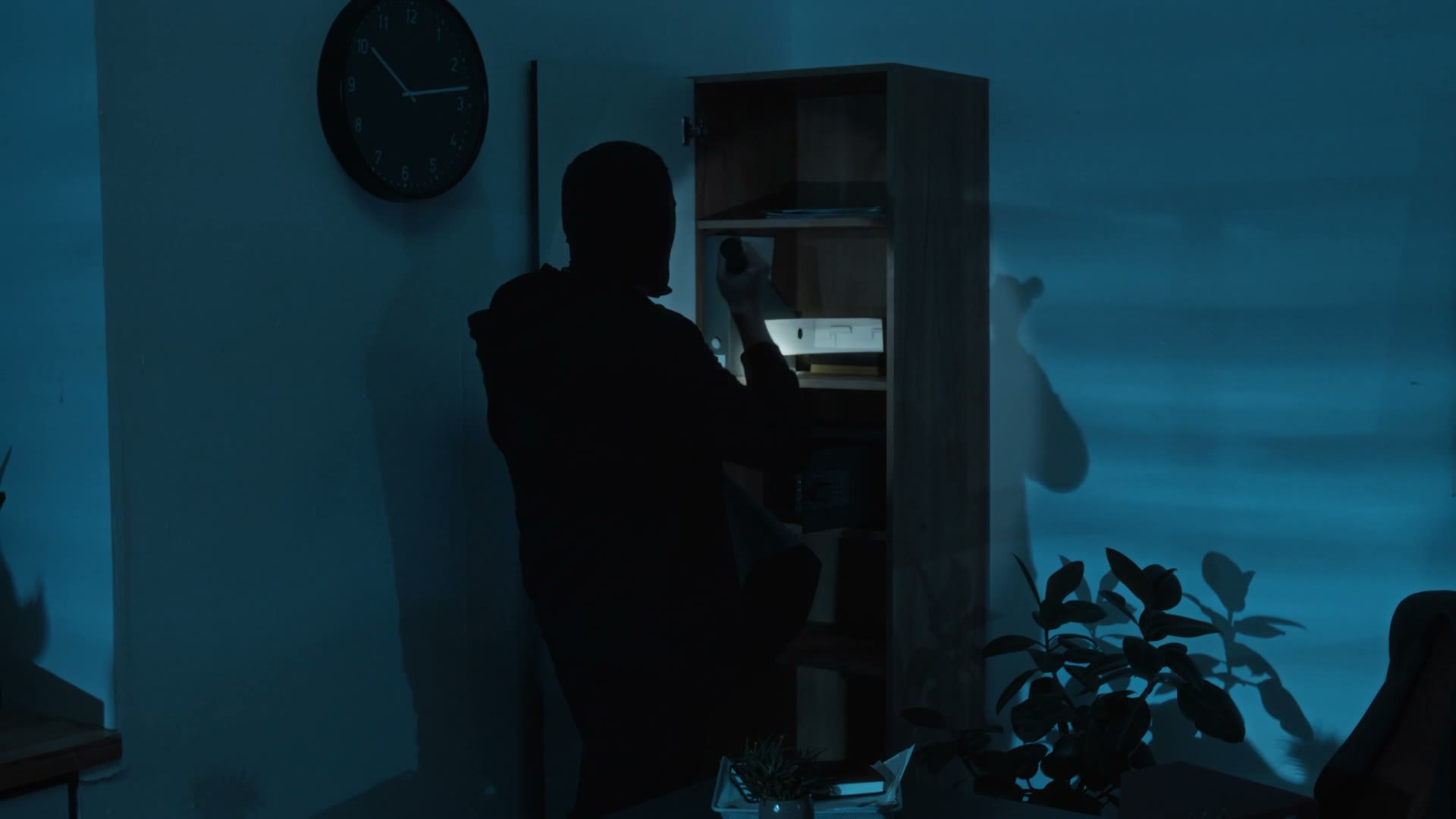 masked-man-robbing-home-at-night.mp4