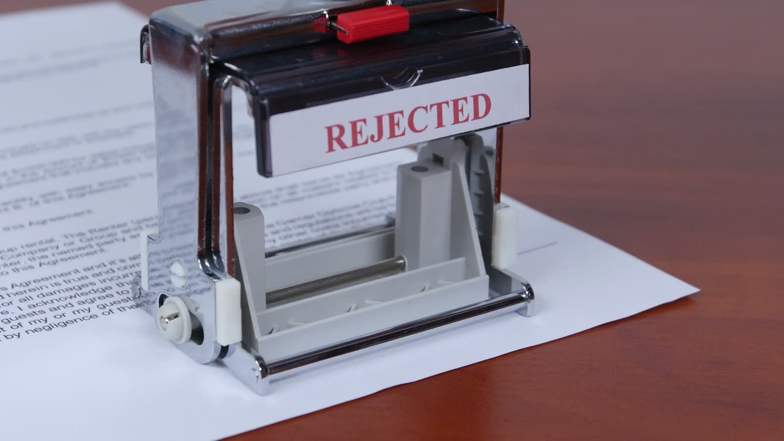 rejected-stamp-on-contract-document-on-desk.mp4