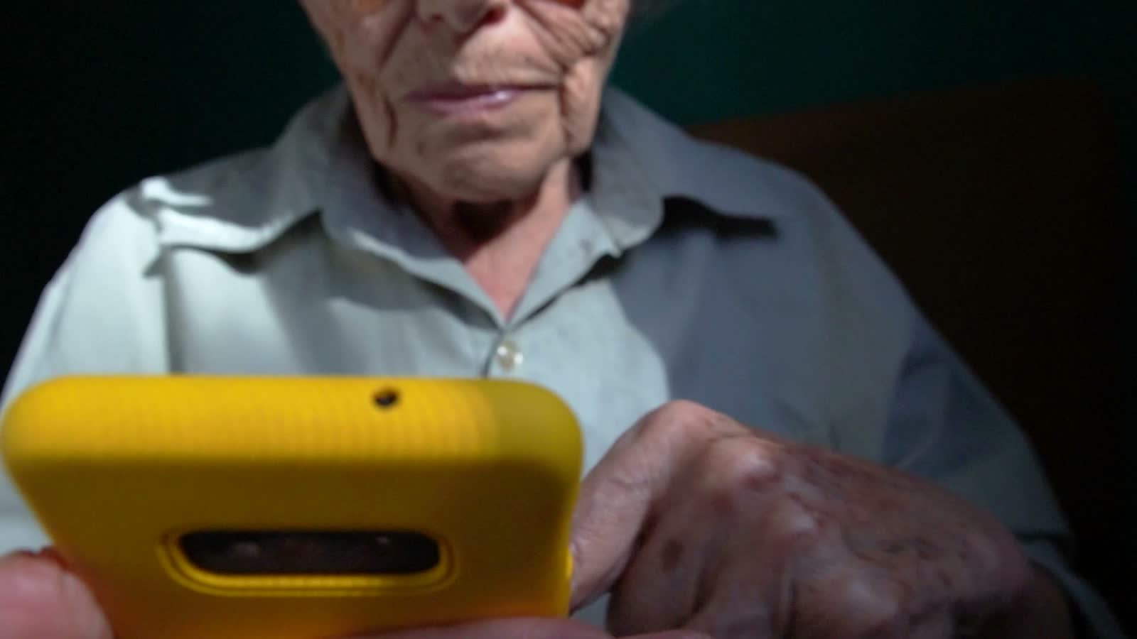 senior-woman-using-smartphone-close-up.mp4