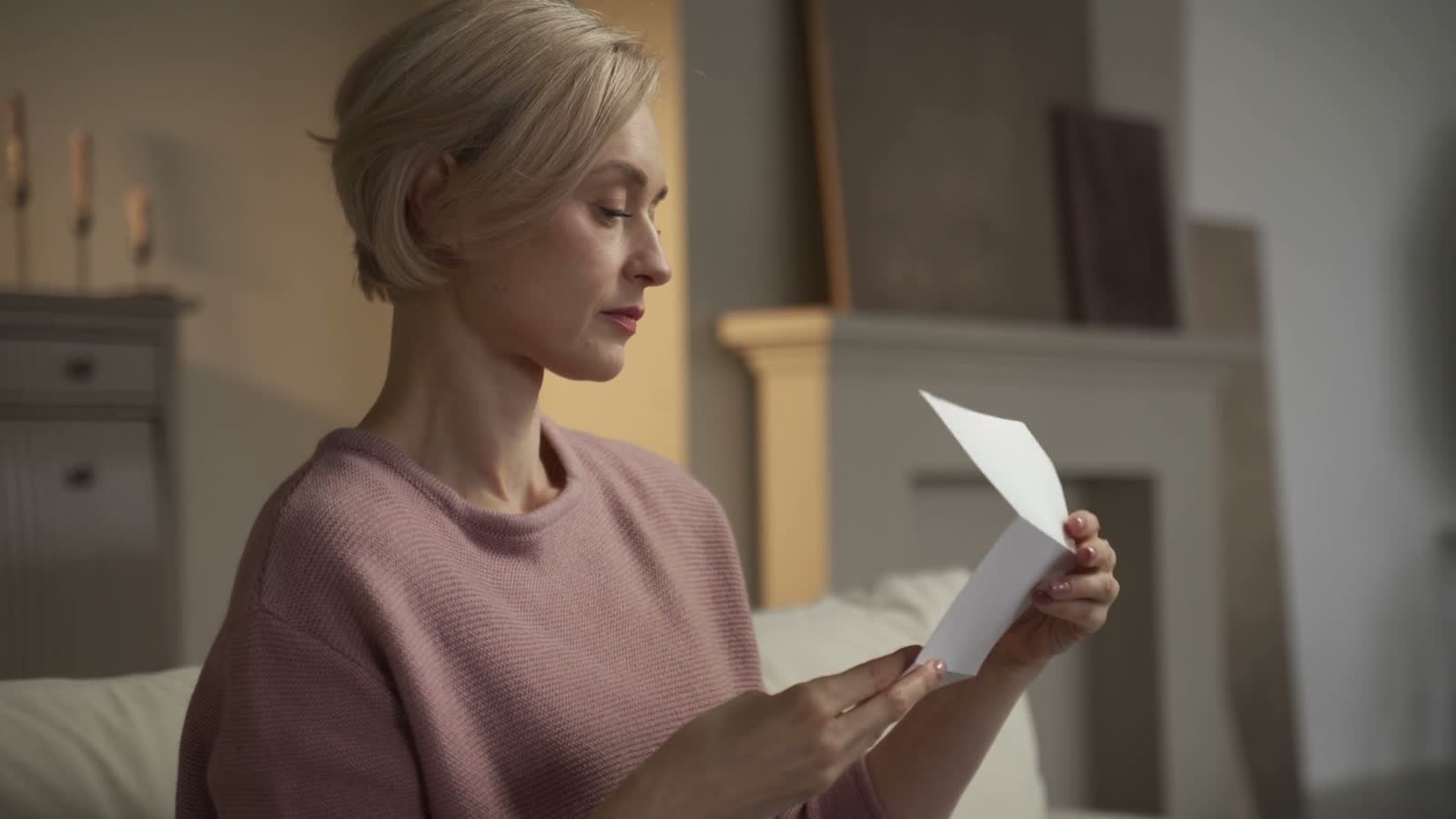 woman-reads-a-letter-with-shocking-news.mp4