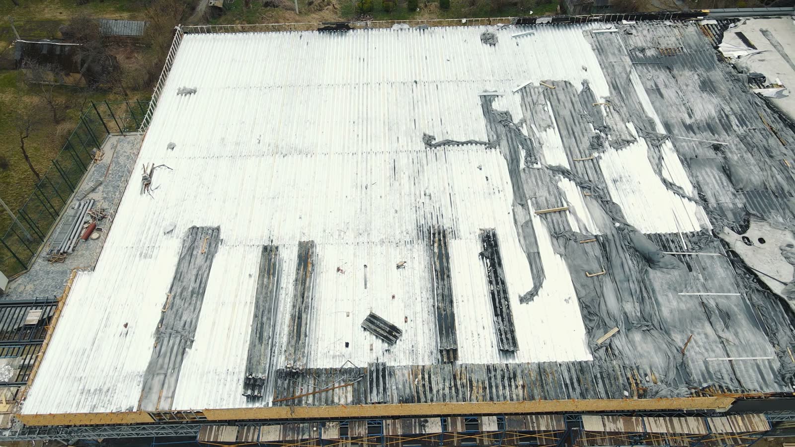 aerial-view-damaged-roof-of-an-industrial-building.mp4
