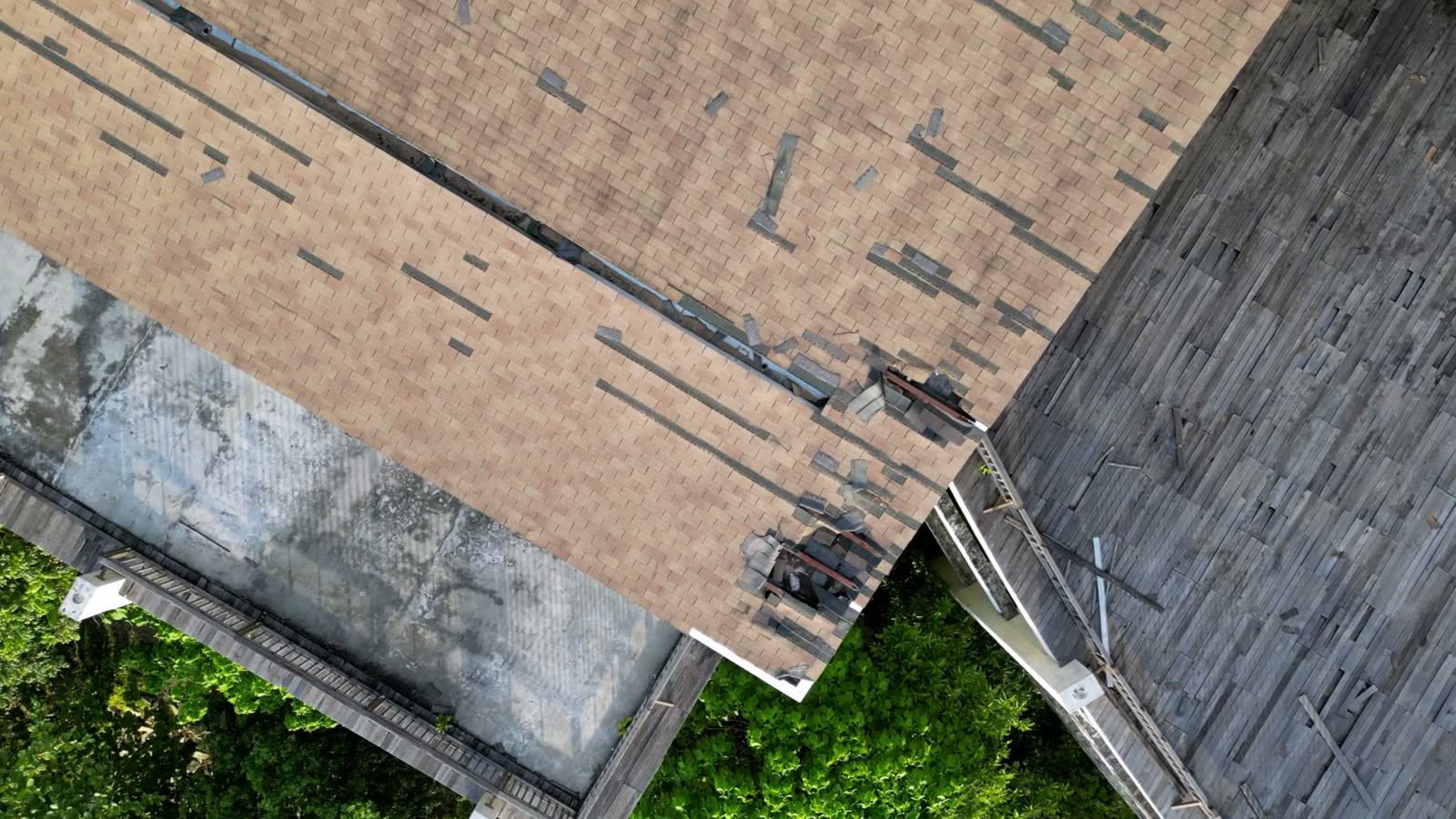 aerial-view-look-down-broken-rooftop-building.mp4