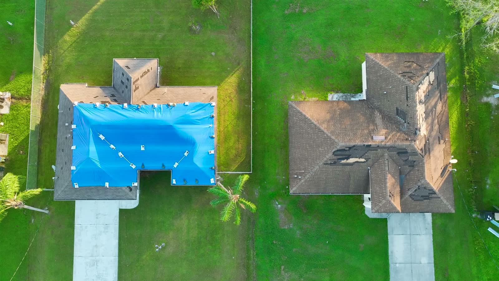 aerial-view-of-damaged-roofs-in-suburban-neighborh.mp4