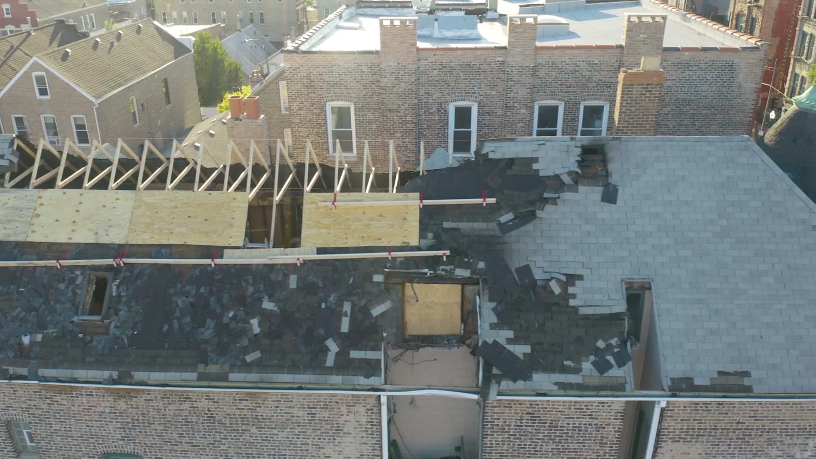 aerial-view-of-roof-repair-in-suburb.mp4