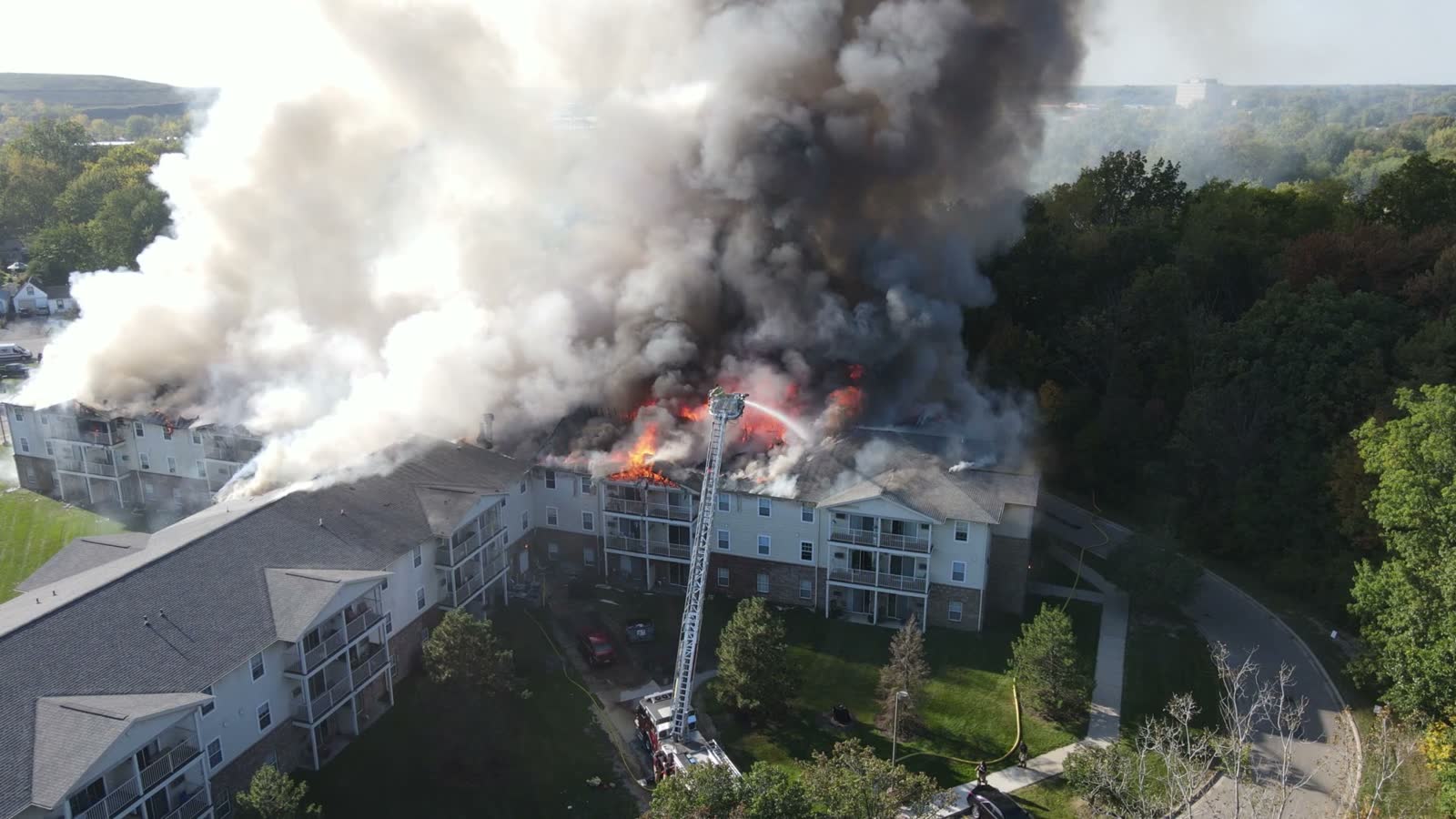 burning-rooftop-of-senior-living-apartments-in-mic.mp4