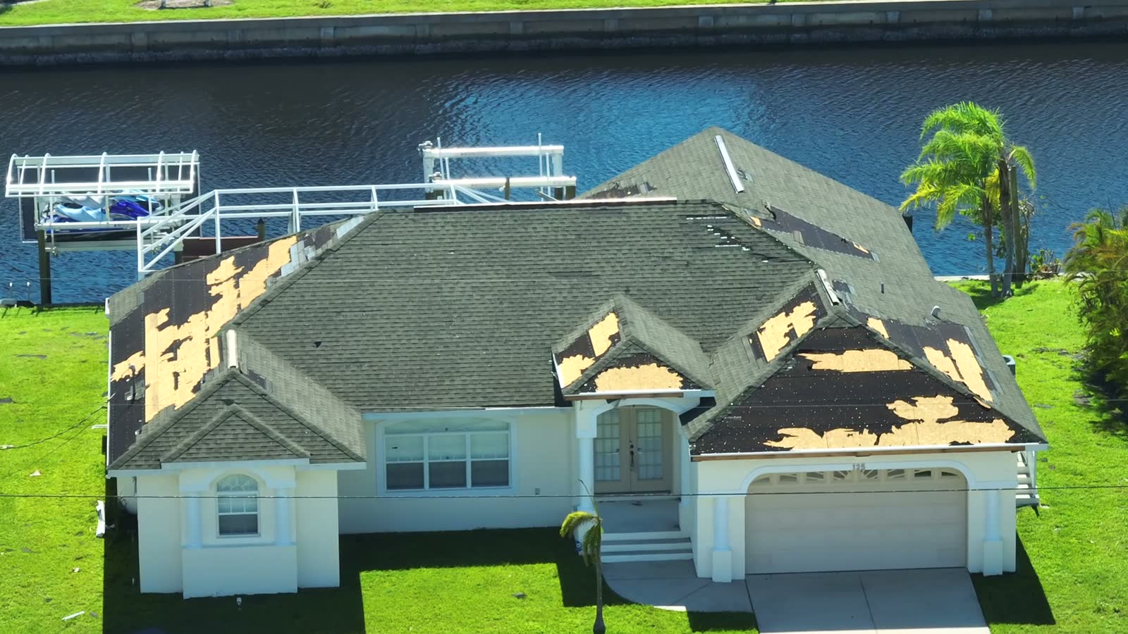 damaged-house-roof-with-missing-shingles-after-hur.mp4