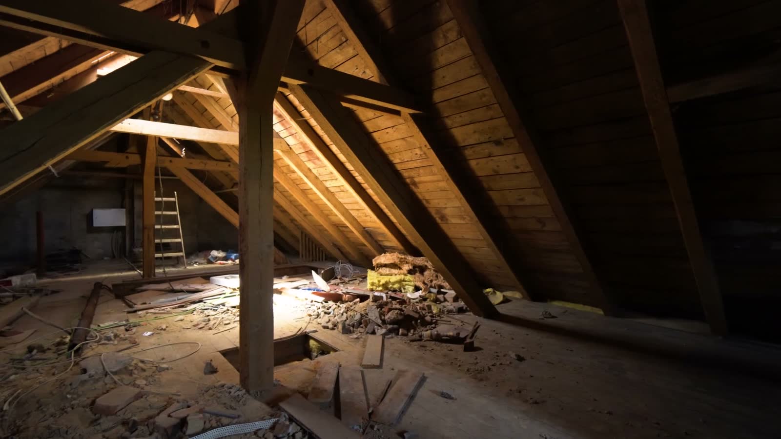 dark-and-cluttered-attic-interior-with-wooden-beam.mp4