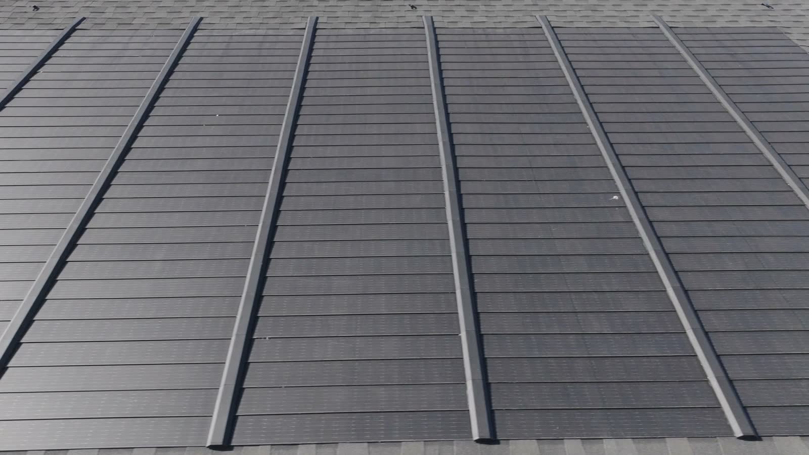 drone-view-of-solar-shingles-on-a-commercial-rooft.mp4