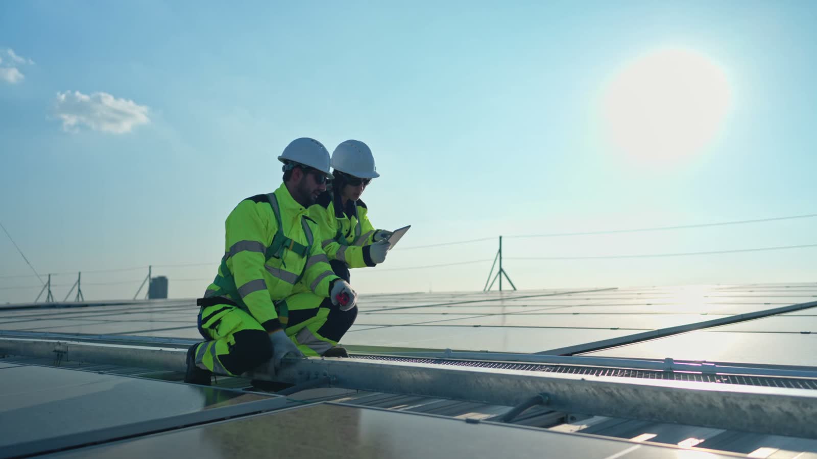 male-and-female-engineers-inspecting-rooftop-solar.mp4