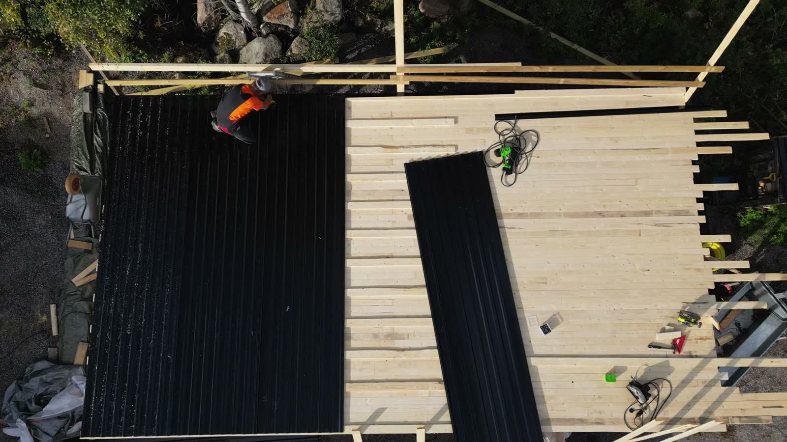 professional-working-on-rooftop-aerial-top-down-v.mp4