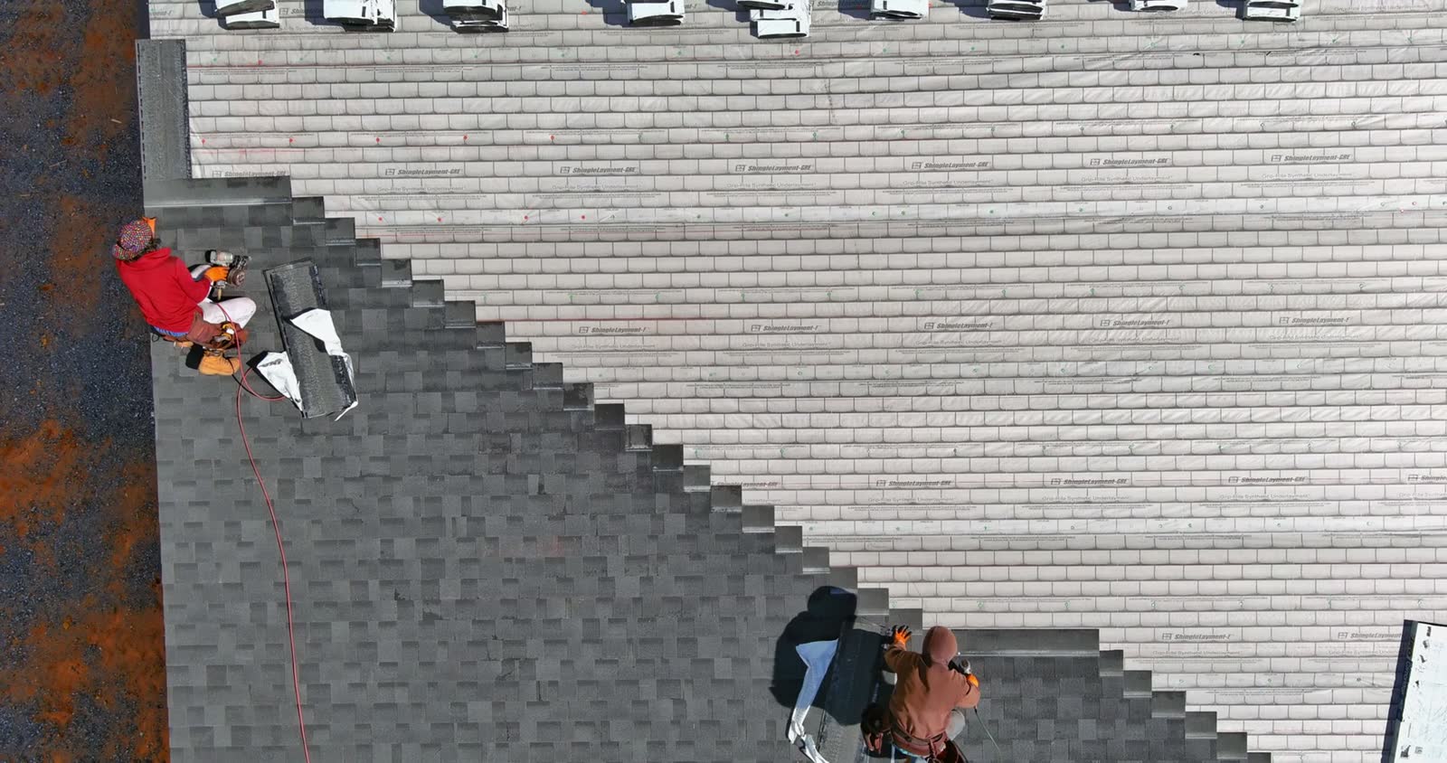 roof-installing-asphalt-shingles-with-new-shingles.mp4
