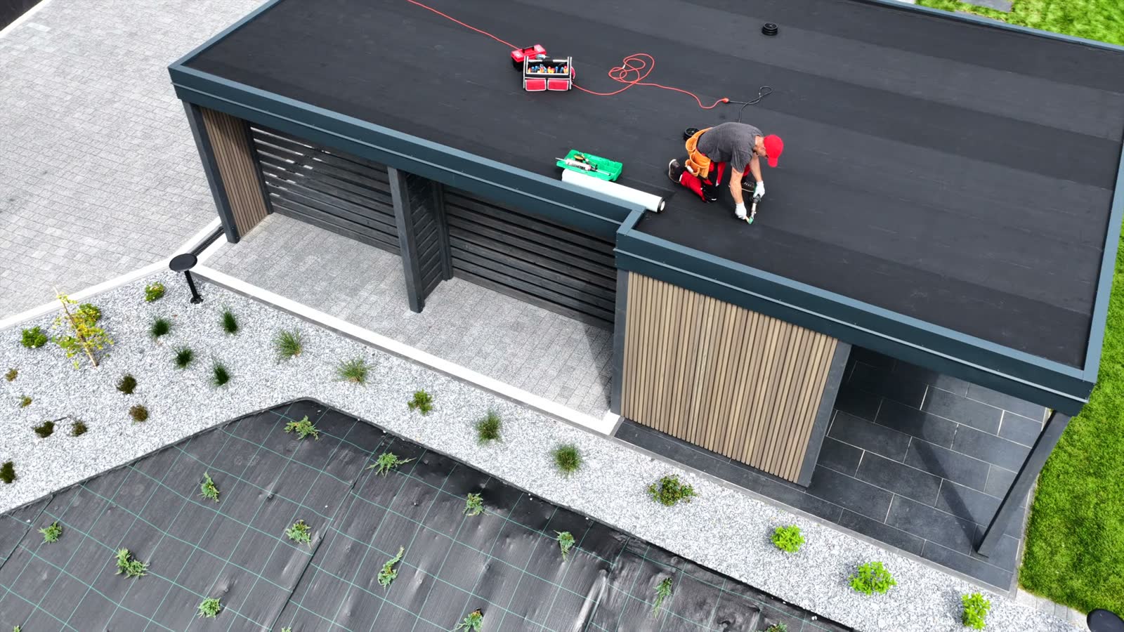 roofer-installing-materials-on-modern-residential.mp4