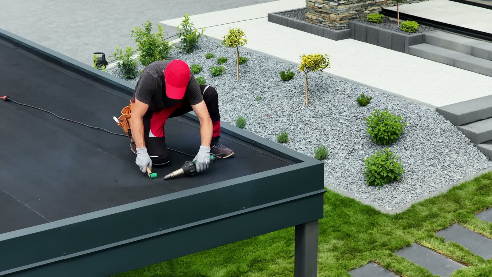 roofer-repairs-flat-roof-with-heat-gun.mp4