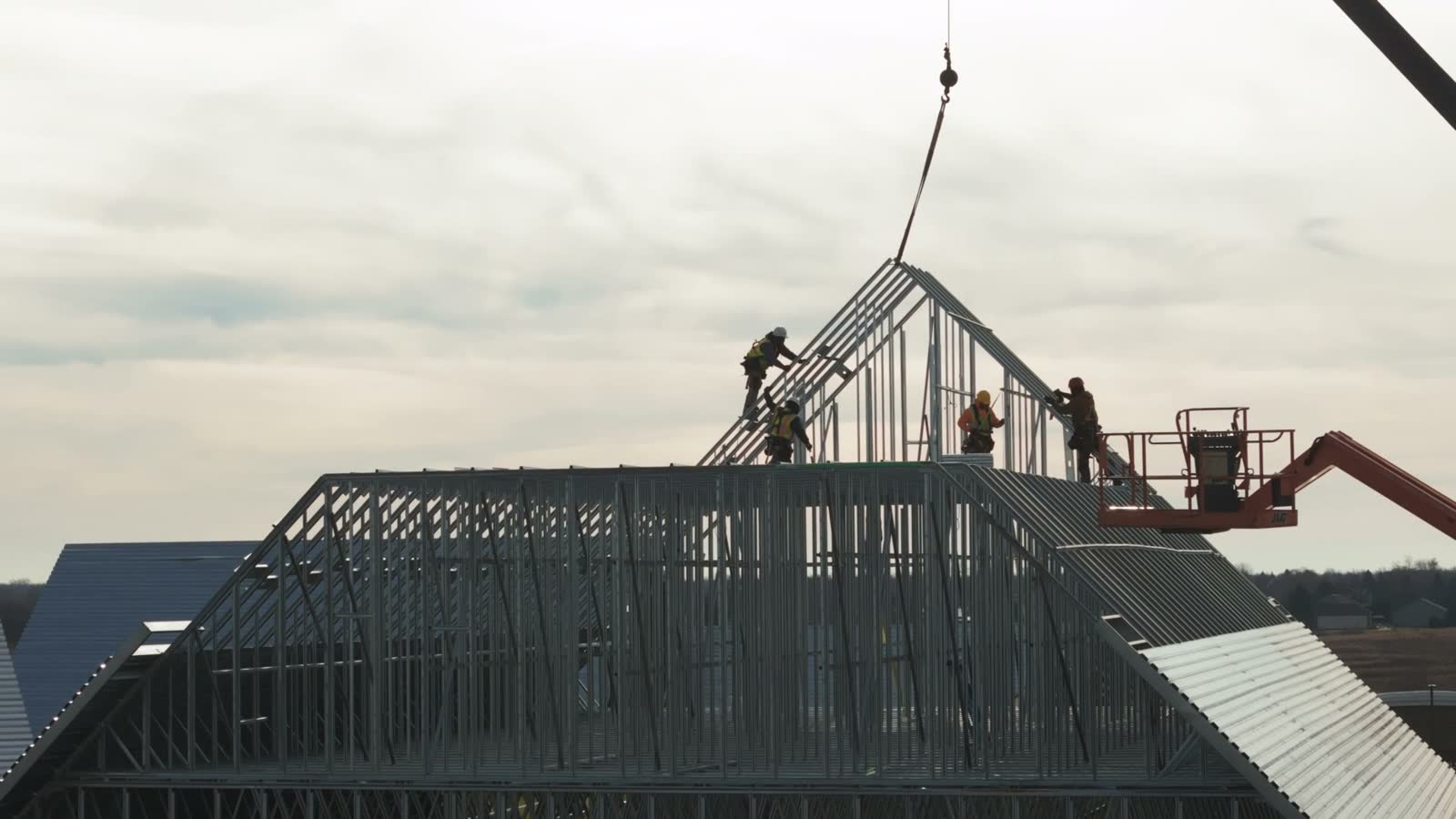 roofers-installing-a-roof-on-an-industrial-buildin.mp4