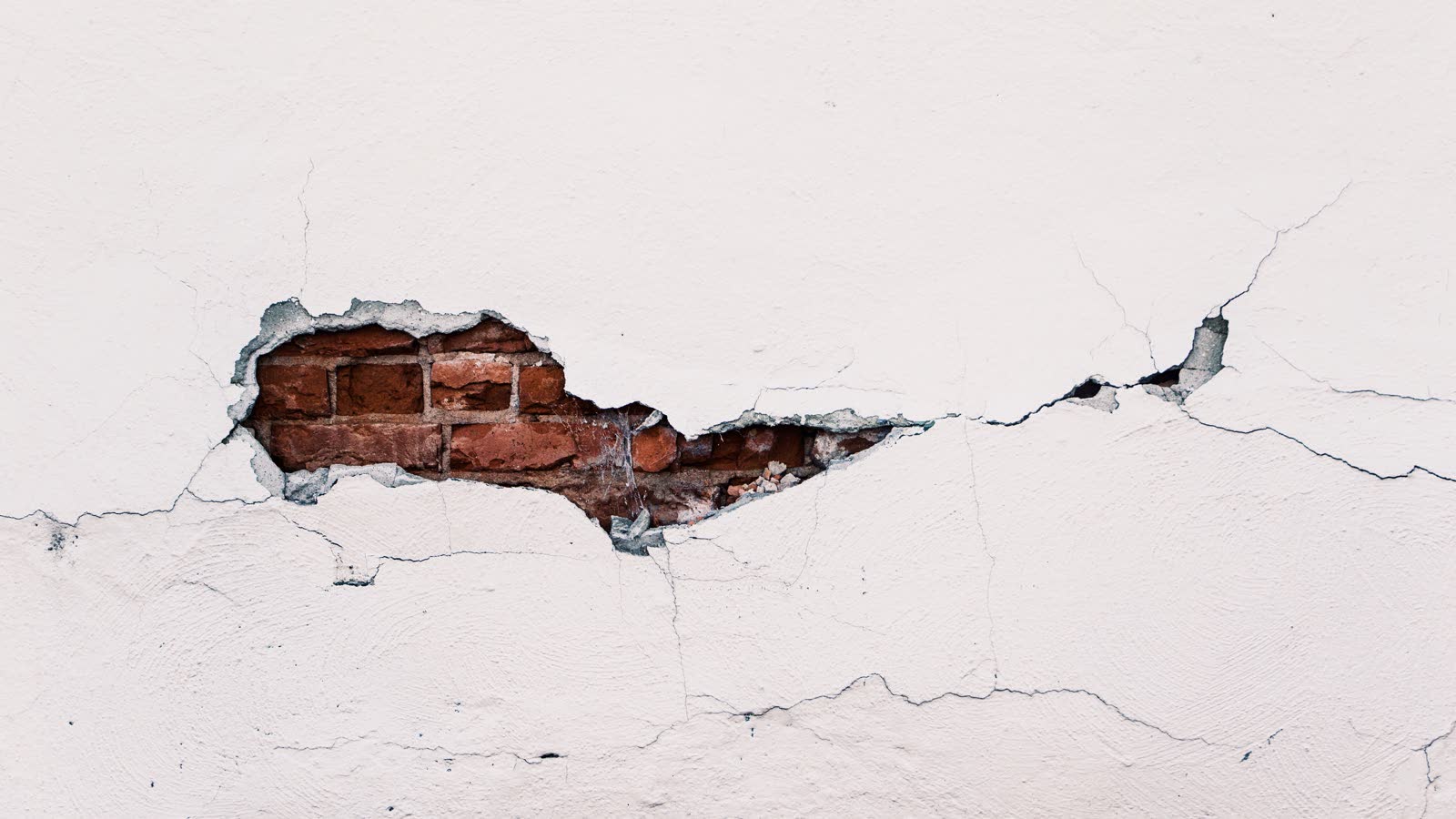 Stair-step cracking through a masonry wall