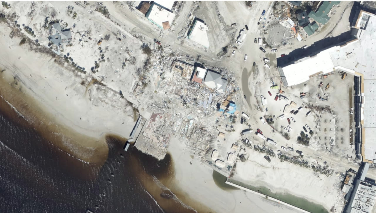 The Times Square district of Fort Myers Beach, stripped to the slab by surge and wind