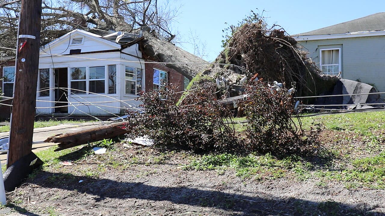 Wind damage in Panama City, miles inland from the surge zone — the roof-claim epicenter